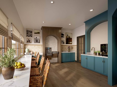 A kitchen with a long counter and a sink.