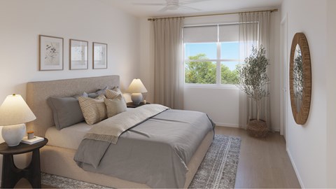 A bedroom with a large bed, a window with curtains, and a round mirror on the wall.
