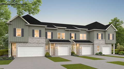 A modern house with a grey exterior and a black roof.