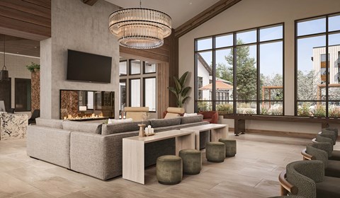 A modern living room with a fireplace and a large couch.