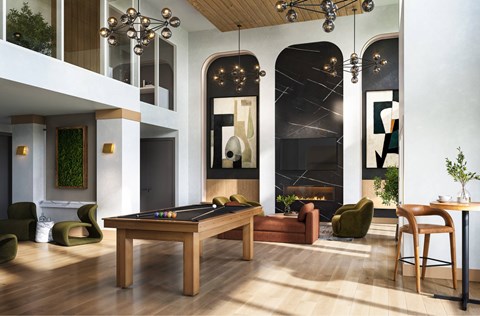 A billiard table is in the middle of a room with a fireplace and a chair.
