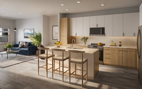 A modern kitchen with a bar stool and a dining table.