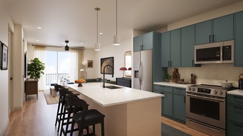 A modern kitchen with a large island and dark blue cabinets.