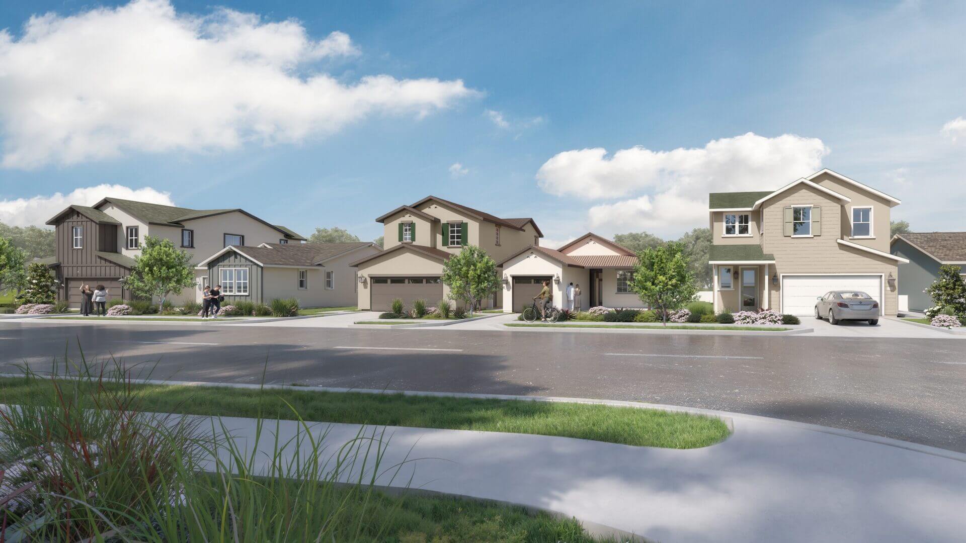 A row of houses with a car parked in front of the first house.