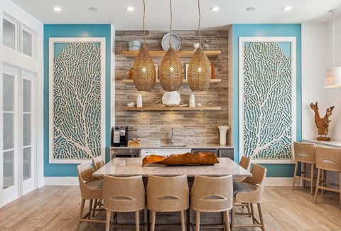 A dining room with a table set for six.