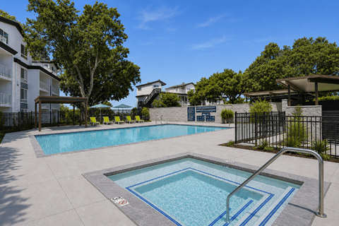A small pool with a metal ladder.
