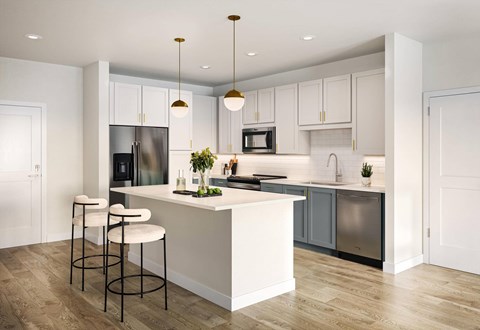 A modern kitchen with a white island and stools.