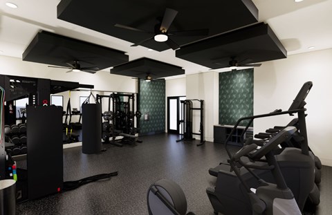 A gym with a variety of equipment including treadmills, weights, and exercise machines.