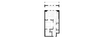 A floor plan of a building with multiple rooms and a second floor.