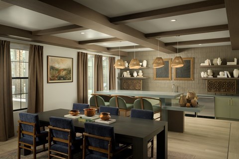 A dining room with a table set for six.