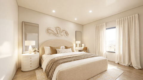 A bedroom with a large bed, a mirror, and a nightstand with a lamp.