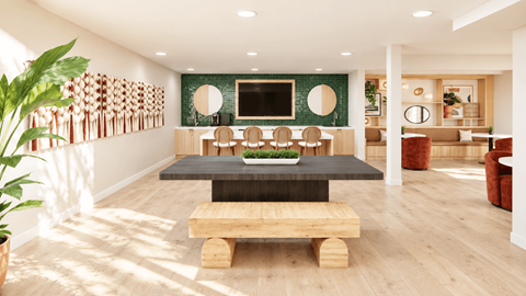 A modern living room with a wooden coffee table and a green plant.