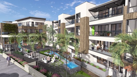 A modern building with a pool in the courtyard.