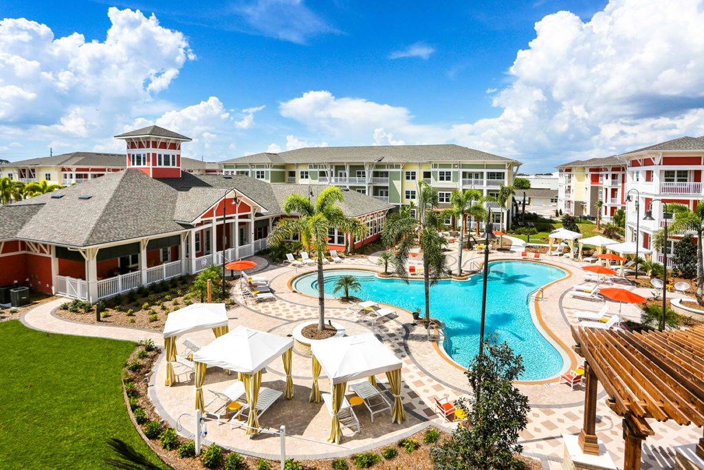 A resort with a pool and a gazebo.