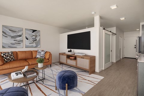 a living room with a couch and a tv
