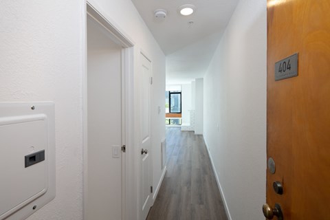 a view of the hallway from the front door