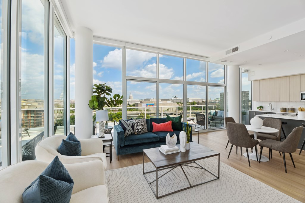 A modern living room with a view of the city.