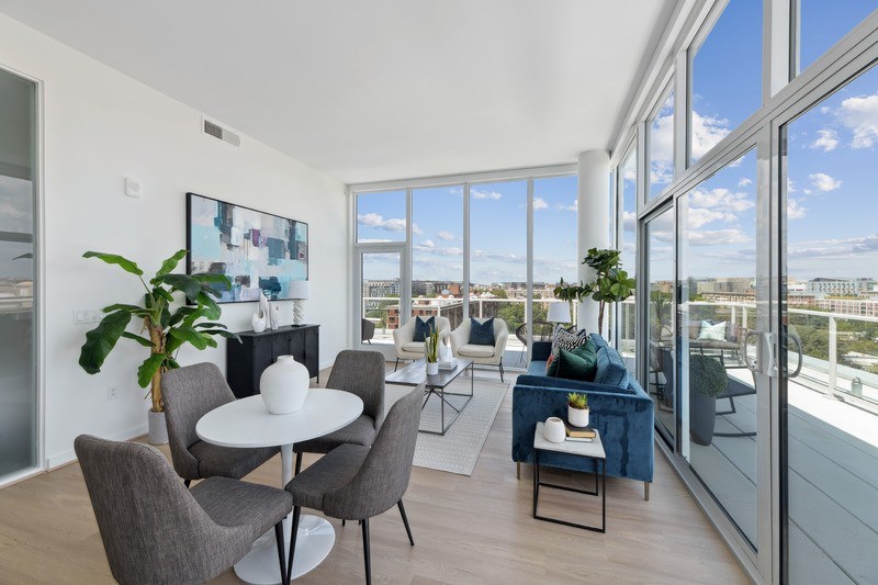 A modern living room with a view of the city.