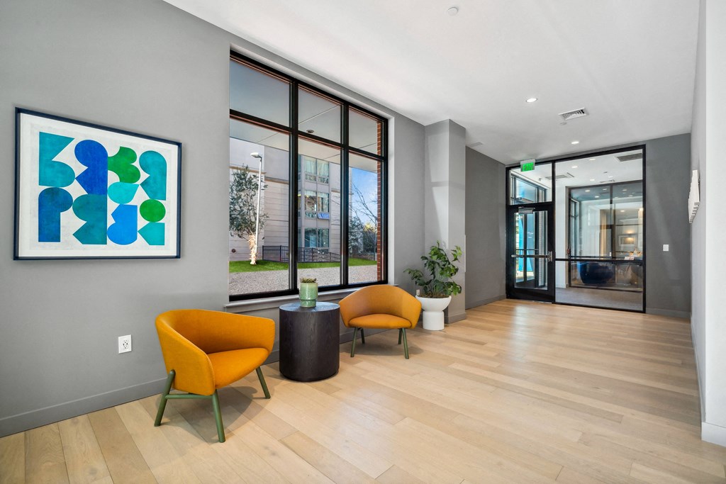 two yellow chairs with large window