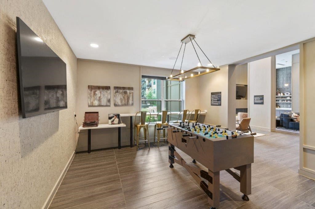 a game room with a foosball table