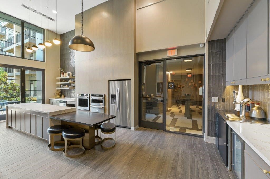 a kitchen and dining area in a modern apartment