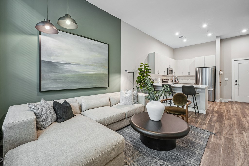 a living room with a couch and a table