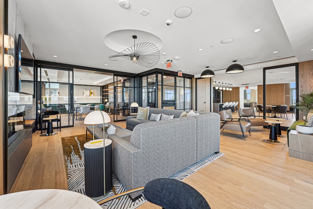 Lounges, including resident sky lounge with fireplace, TV lounge, solarium, Uber lounge, and demonstration kitchen with private dining room