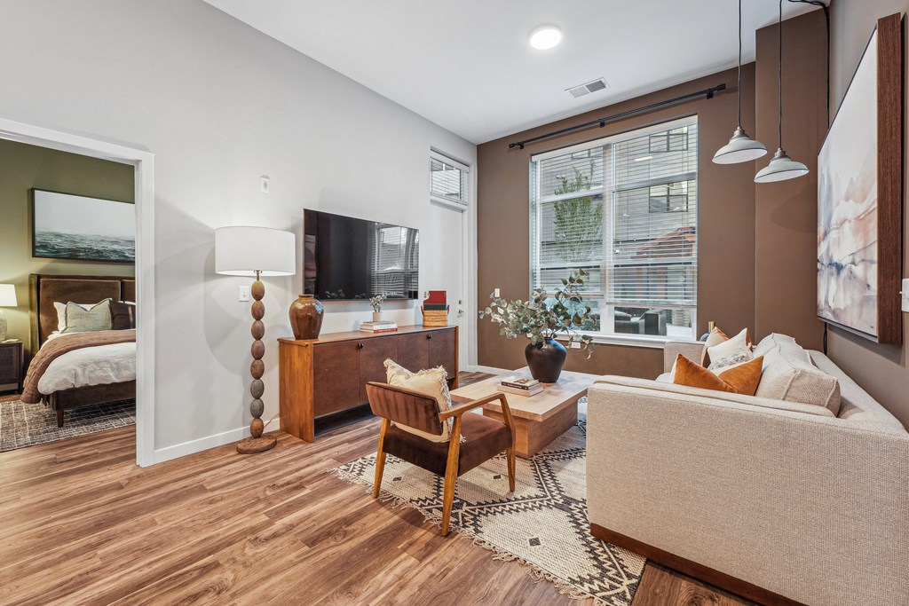 a living room with a couch and a tv