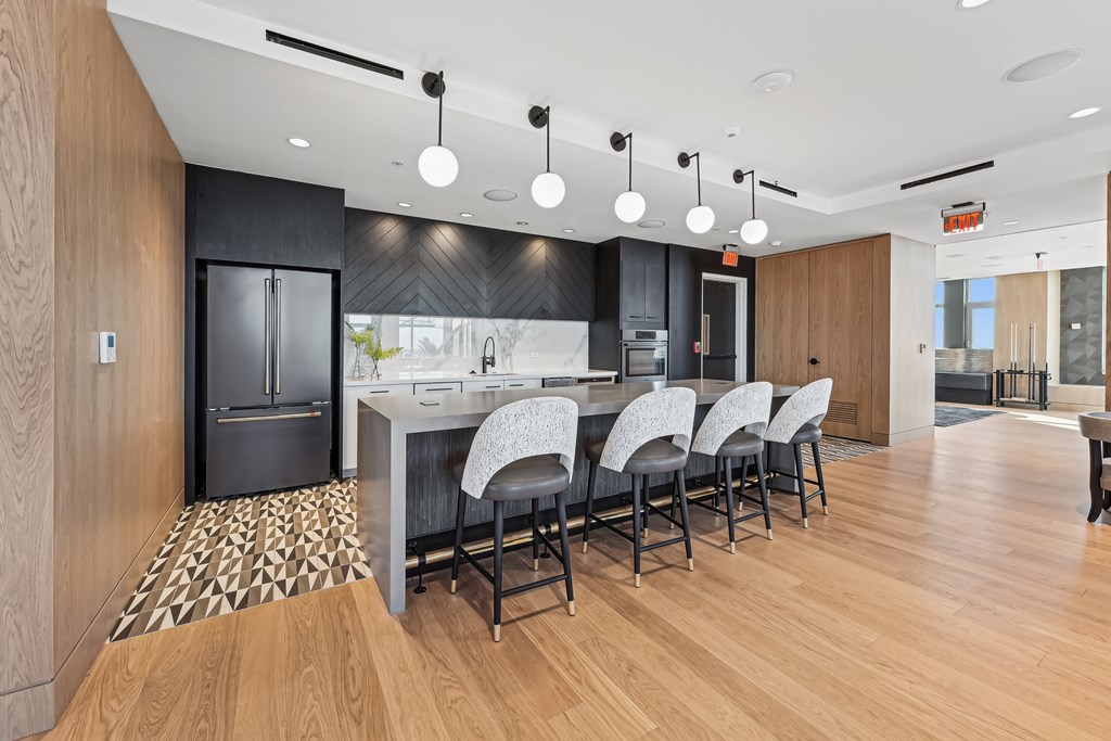 Lounges, including resident sky lounge with fireplace, TV lounge, solarium, Uber lounge, and demonstration kitchen with private dining room