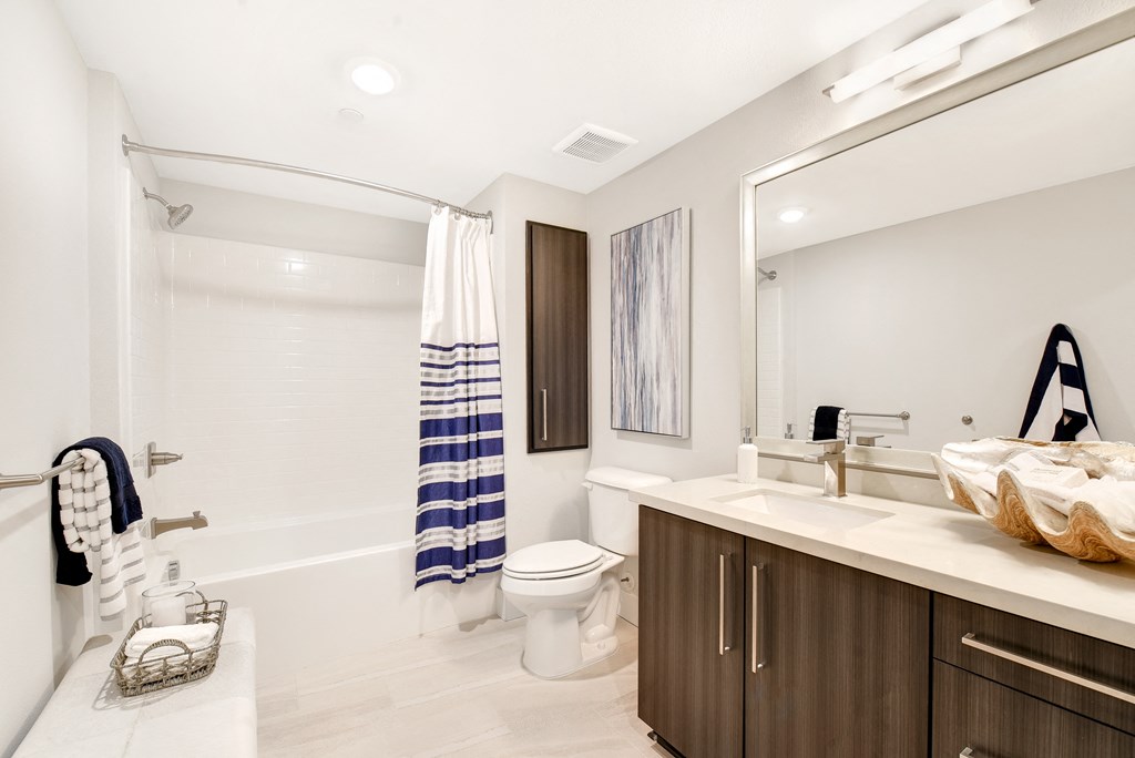 Bathroom with a shower  at Sola, San Diego