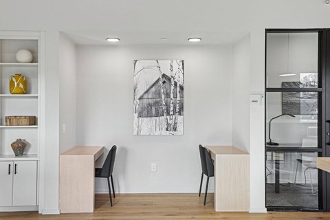an open kitchen and dining area with a table and chairs