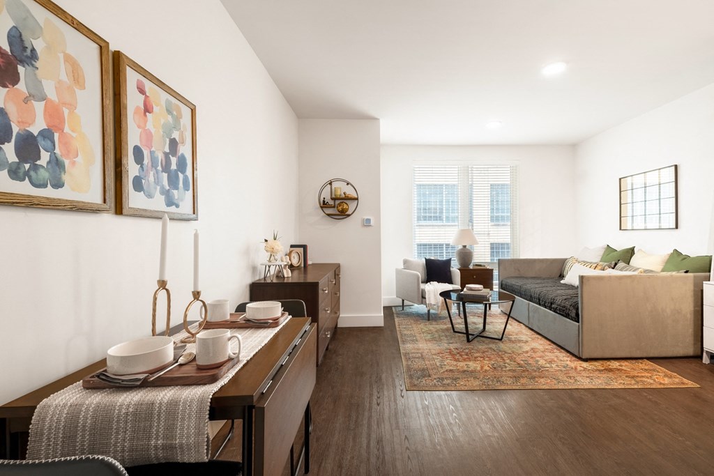 a living room with a couch and a table