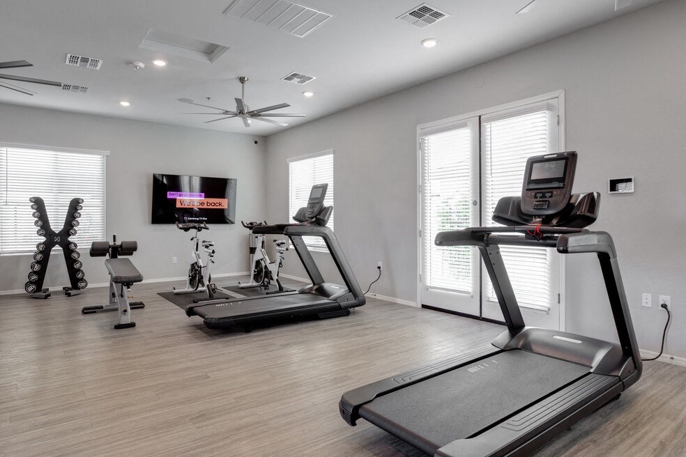 the estates apartments fitness room with treadmills