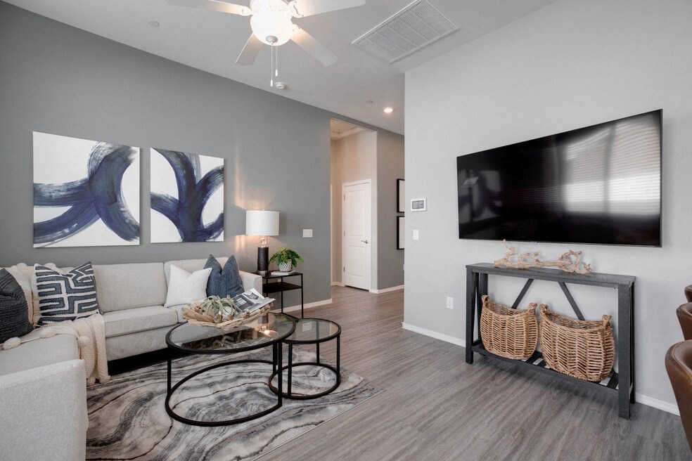 a living room with a couch and a tv