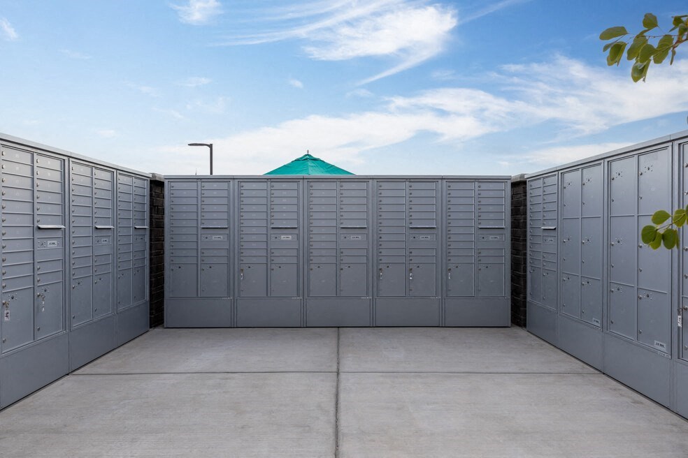 a garage with multiple doors on the side of a building
