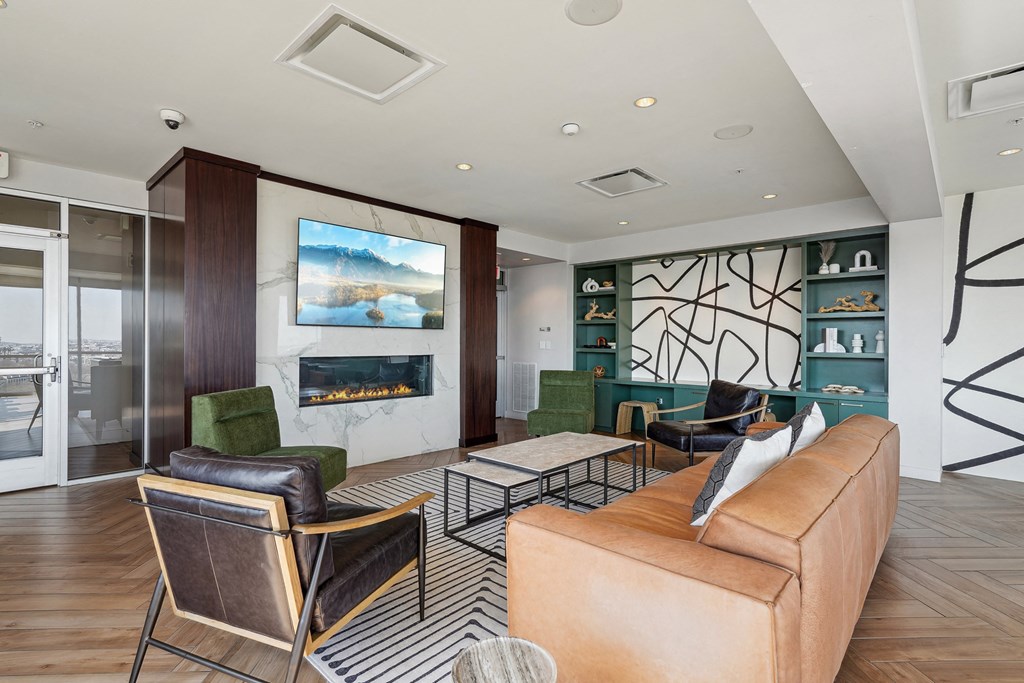 a living room filled with furniture and a fire place