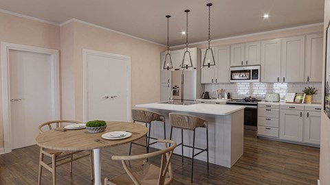 a kitchen and dining room with a table and chairs