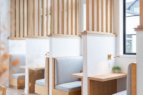 A room with a desk and a chair.