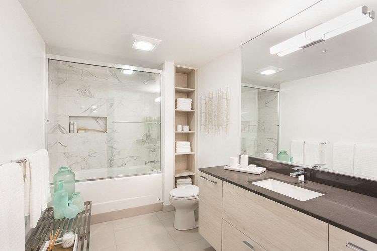 a bathroom with a toilet sink and a bathtub