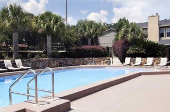 Swimming Pool With Relaxing Sundecks at Jasmine Creek Apartments, Pensacola, Florida