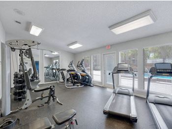 Fitness Center With Updated Equipment at Jasmine Creek Apartments, Pensacola, FL, 32514
