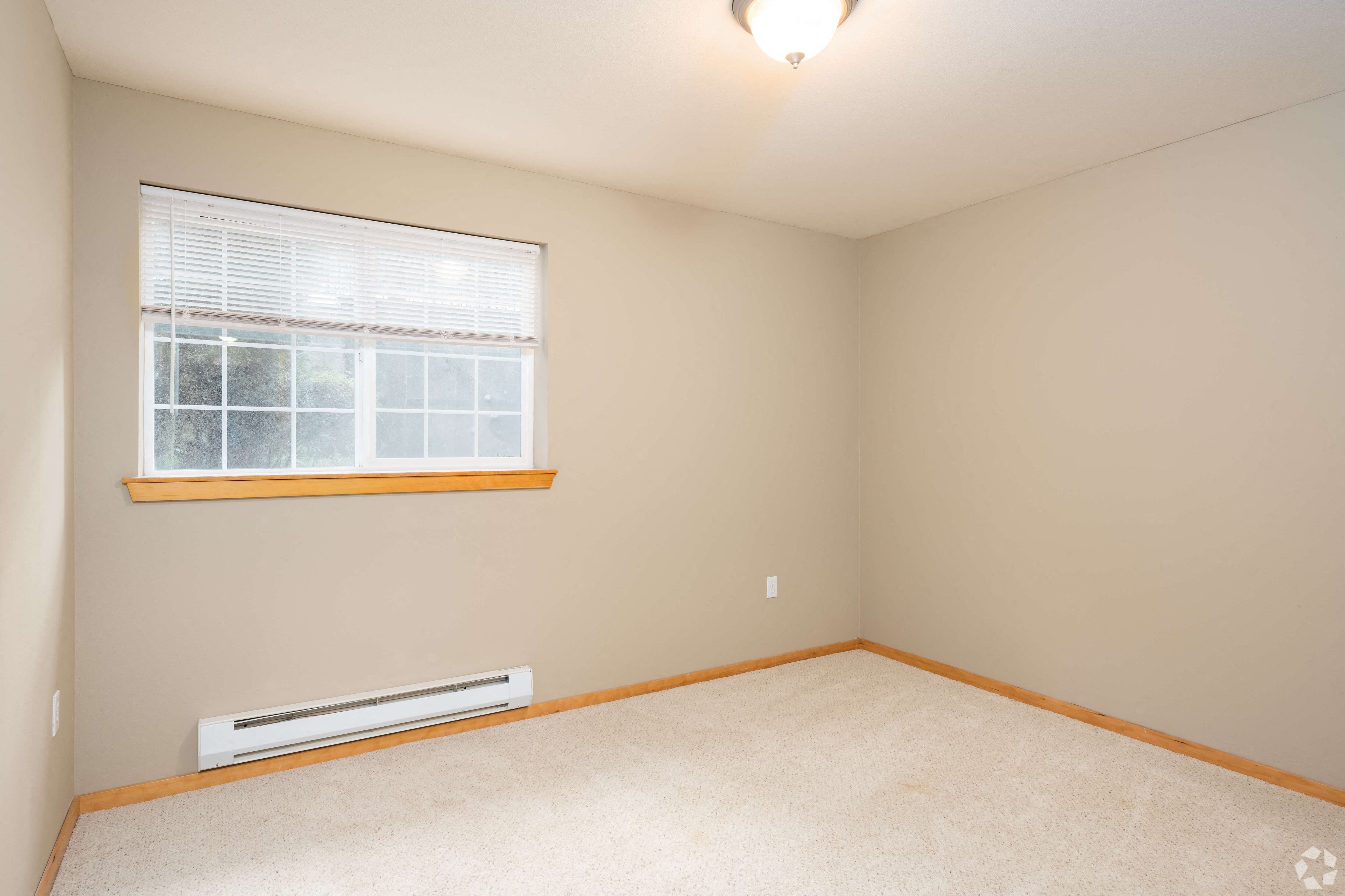 Bedroom with ceiling light at Springbrook Reserve Apartments,Seattle, Washington, WA