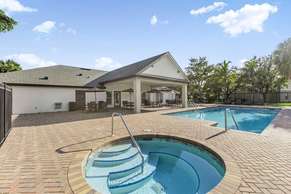 A house with a pool in the backyard.