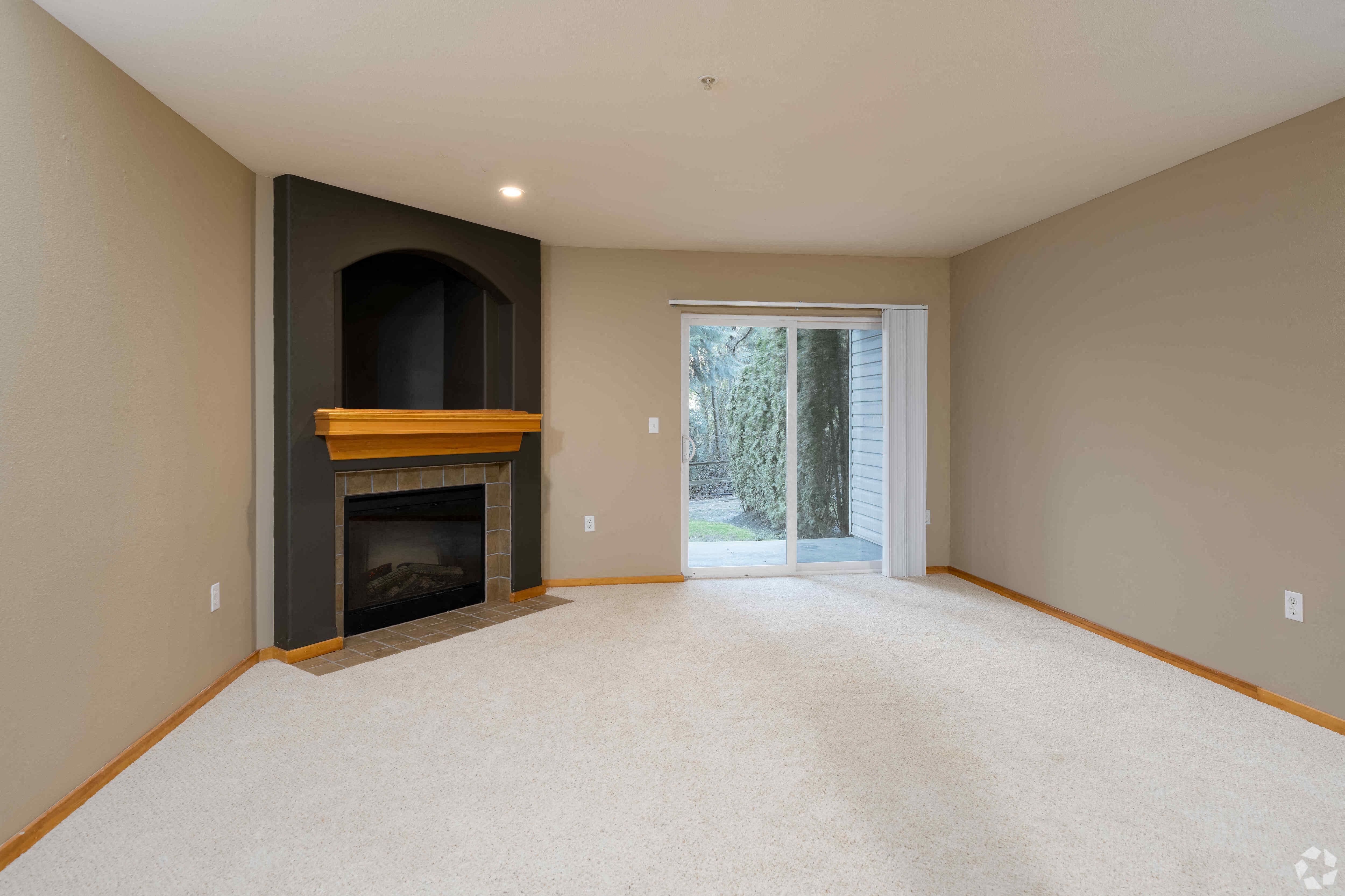 Living Room with fireplace at Springbrook Reserve Apartments,Seattle, Washington