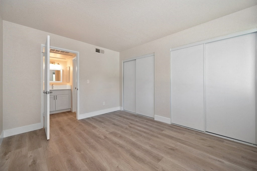 a bedroom at the cornhill landing apartments in rochester, ny