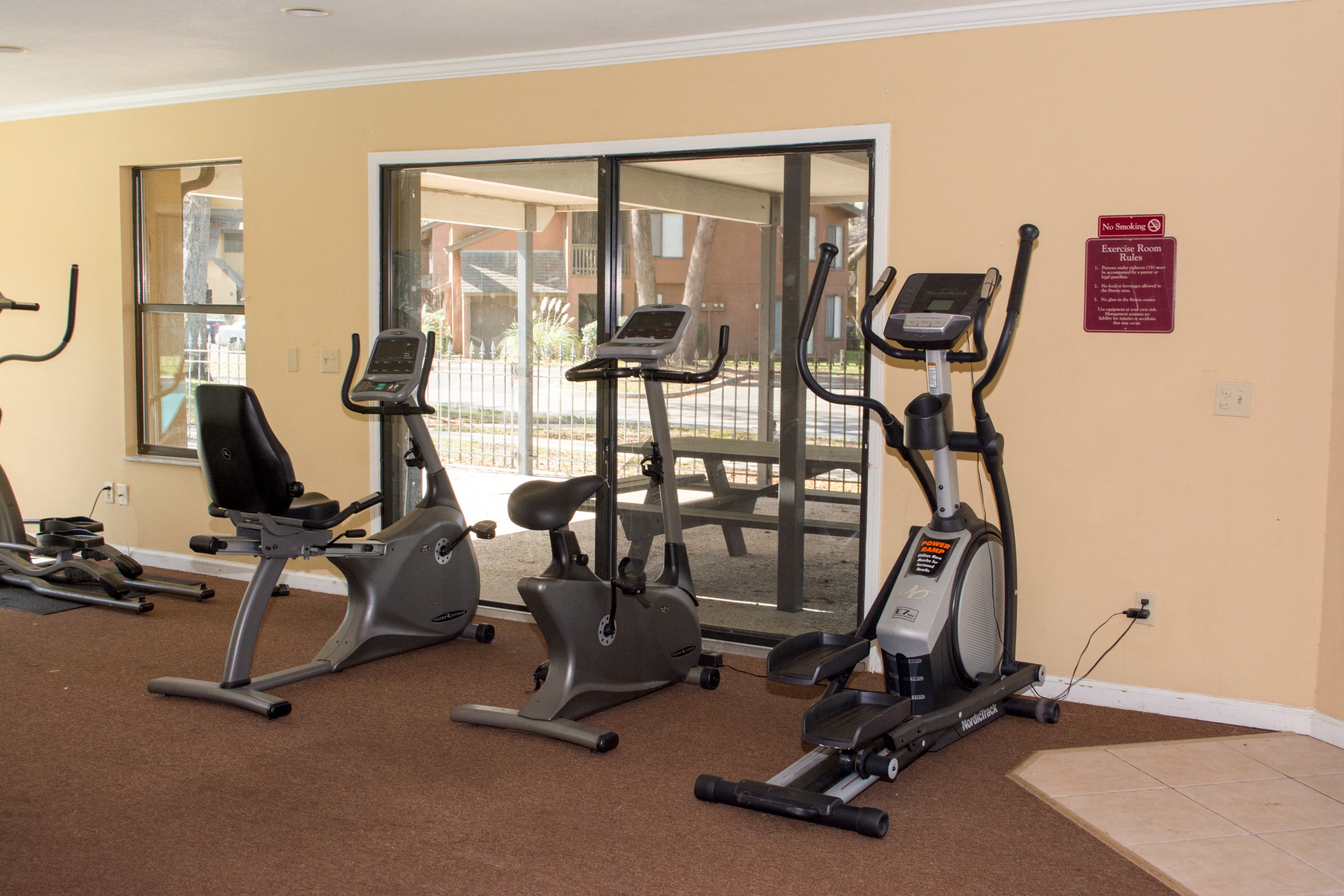 the gym has a variety of exercise equipment