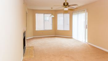 Living room with ceiling fan at Laurel Grove Apartment Homes, Orange Park, FL, 32073