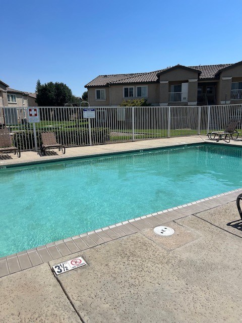 A pool with a sign that says 3% on the ground.
