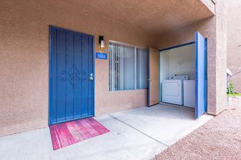 Exterior Front Door Washer Dryer at Playa Vista Apartments, PSDM, Nevada, 89110