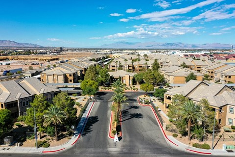 an aerial view of a neighborhood with houses and trees